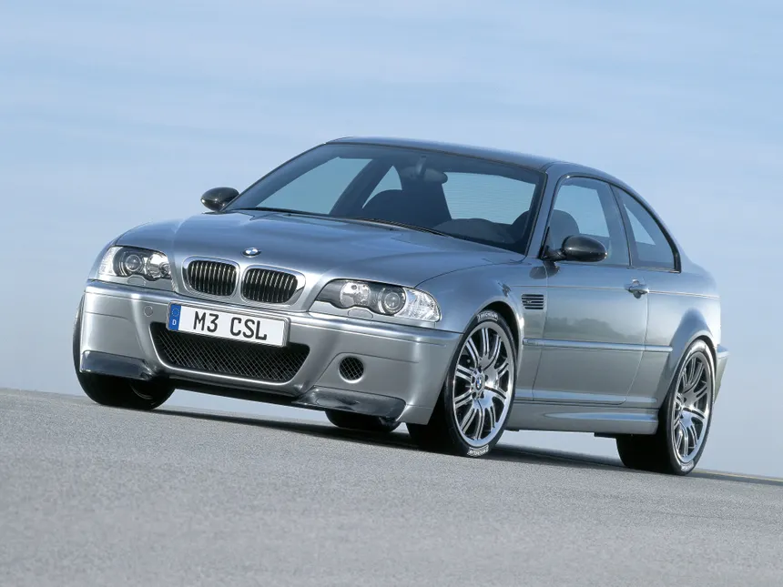 Silver BMW M3 E46 CSL with carbon fiber roof seen from front three-quarter angle