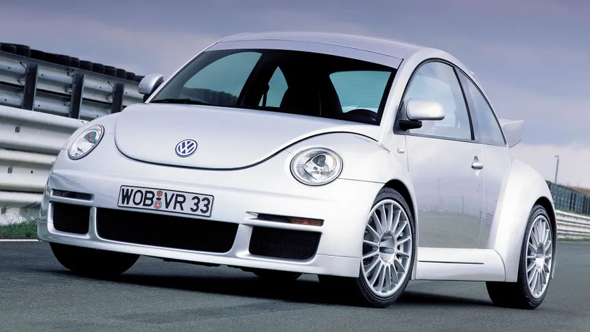 Silver Volkswagen New Beetle RSI front three-quarter view showing 80mm wider bodywork OZ Superturismo 18-inch wheels and dual rear spoiler arrangement