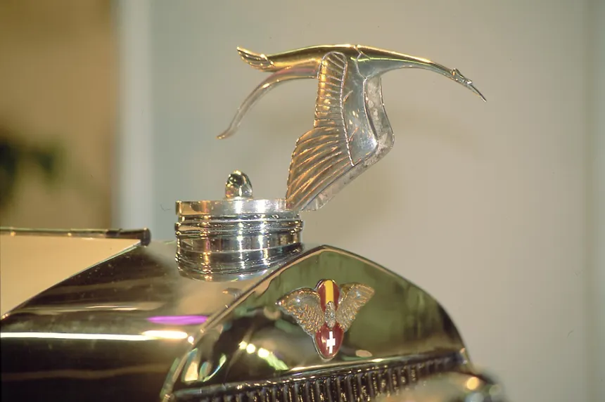 Georges Guynemer, French aviation ace, beside his SPAD VII with Hispano-Suiza engine and the stork emblem of his Les Cigognes squadron