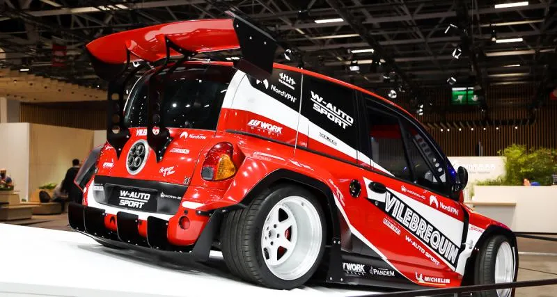 Pagani-style quad-tip center-exit exhaust detail on the rear of Vilebrequin's Fiat 1000Tipla"