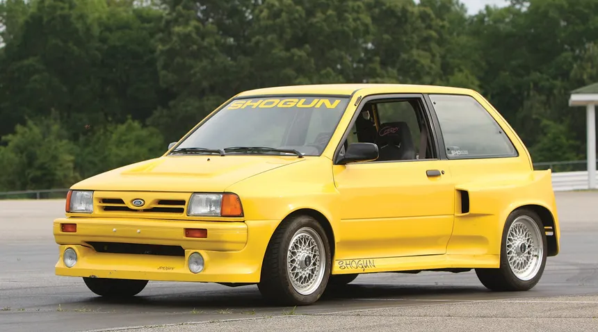 Ford Festiva SHOgun with widebody flares and three-piece BBS wheels in side profile