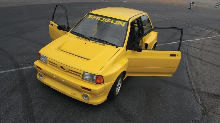 Ford Festiva SHOgun interior with Cobra seats, Momo steering wheel and VDO gauges"