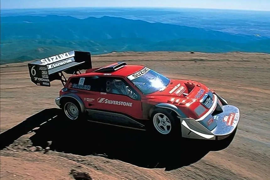 The truth about the Suzuki Escudo Pikes Peak: nearly 1,000 CV, Gran Turismo fame and why the race's most famous car never won it. Complete Tajima history.