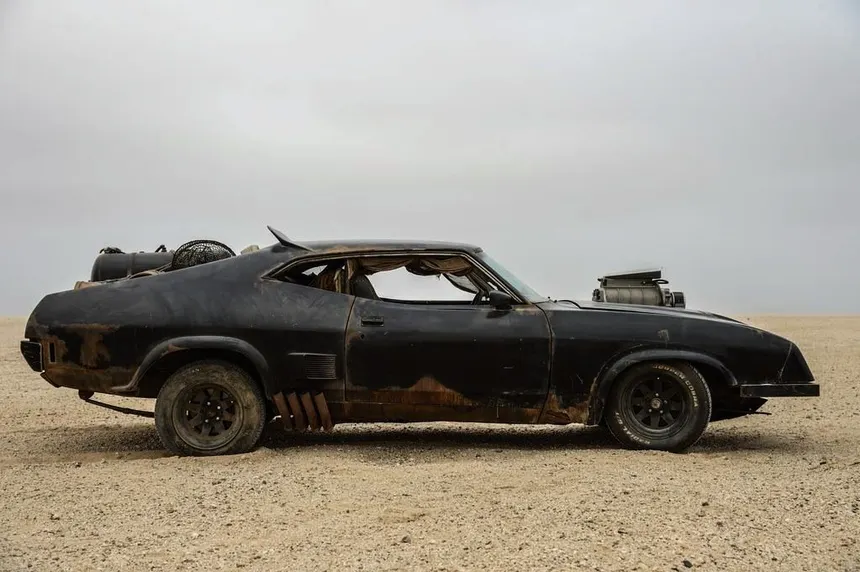 Mad Max Interceptor Ford Falcon XB GT in matte black with Weiand supercharger on the bonnet