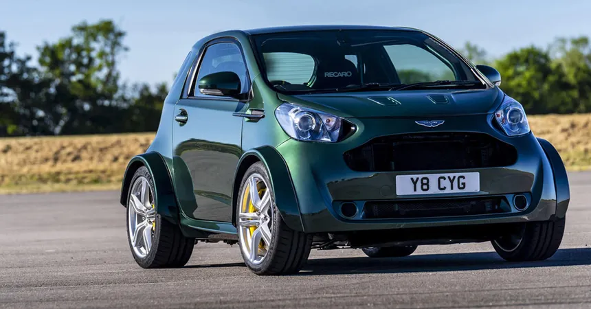 Aston Martin V8 Cygnet climbing the hill at the Goodwood Festival of Speed