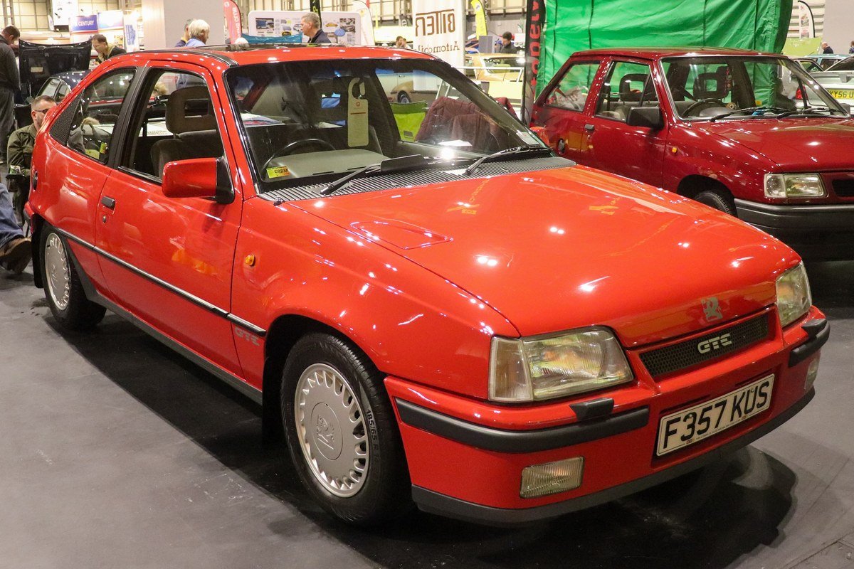 Red 1989 Vauxhall Astra GTE 16V on display at a classic car show