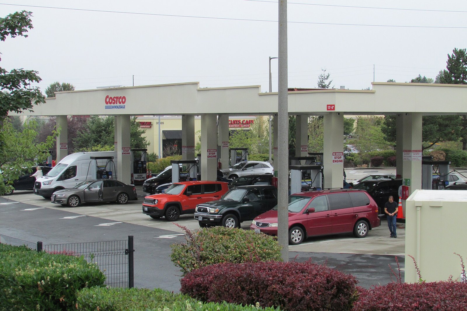 Costco gas station with cars lined up at the pumps