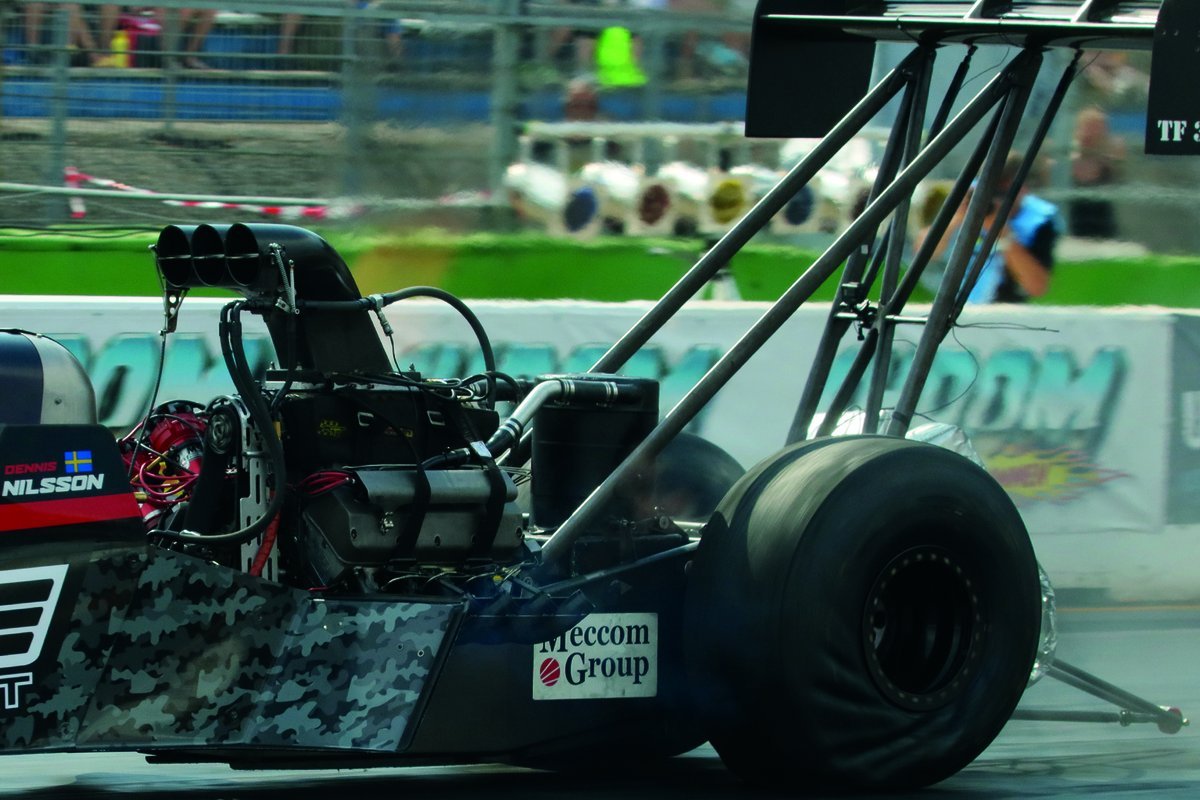 Top Fuel dragster with its supercharger and injector scoop on top of the V8