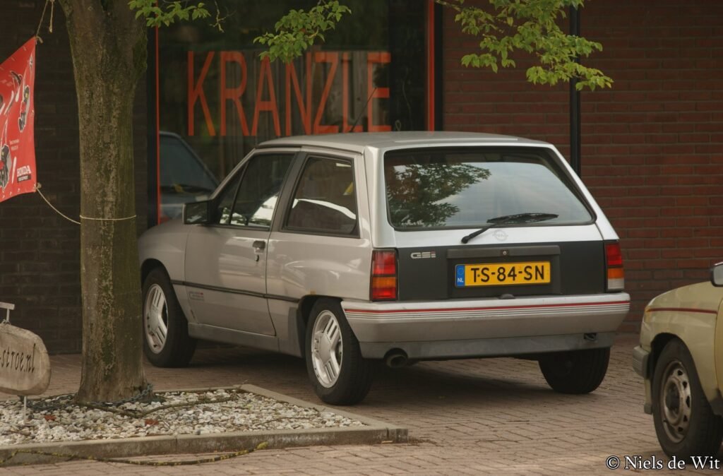 Silver 1988 first-series Opel Corsa A GSi seen from the rear