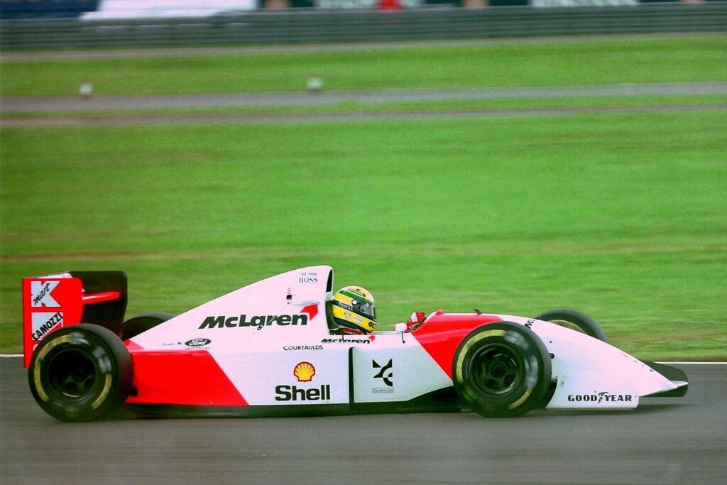 Ayrton Senna in the Ford-powered McLaren MP4/8 at Silverstone in 1993, the chassis behind the MP4/8B Lamborghini test car